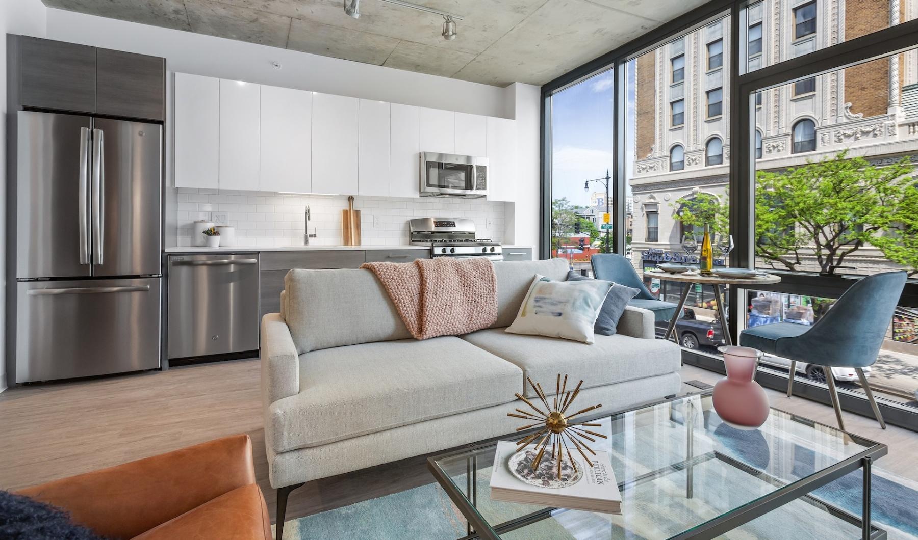 a living room with a glass table