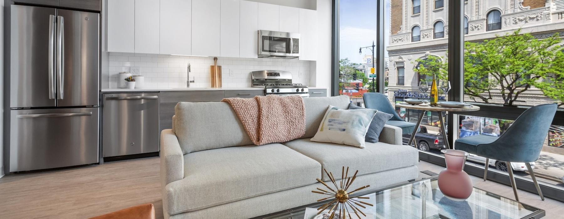 a living room with a glass table